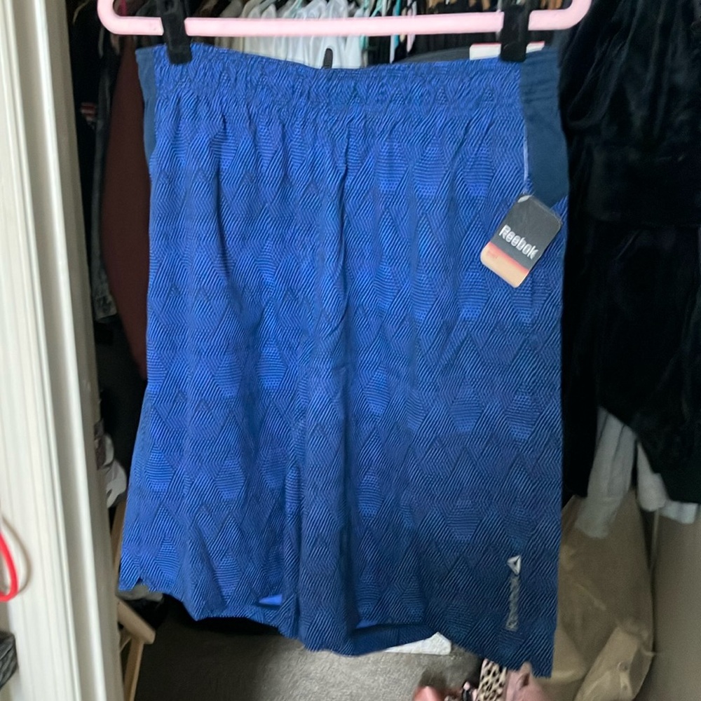 Reebok nomad acid blue Athletic Shorts